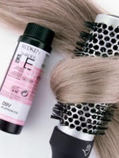 Roller hair brush and Redken product